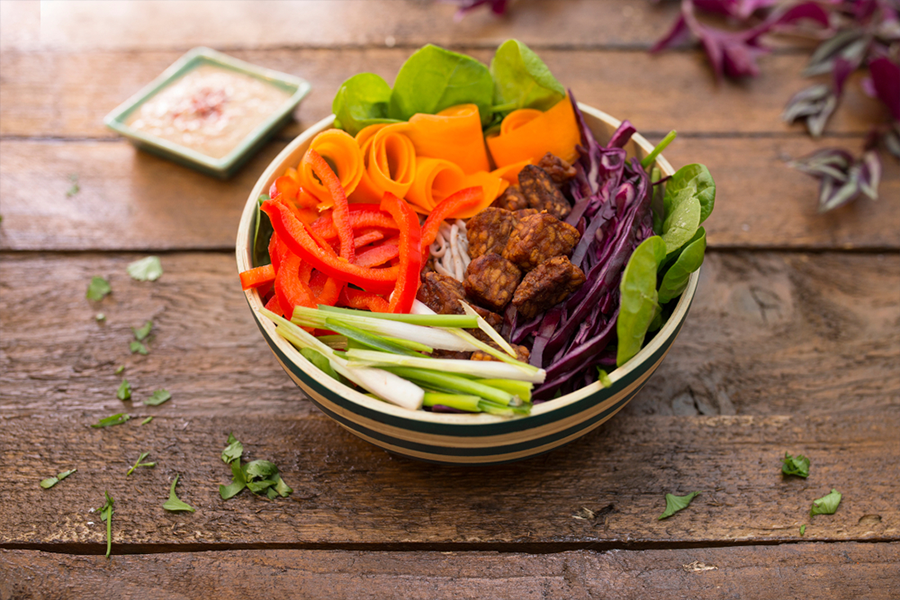 Bowl filled with multicolored veggies