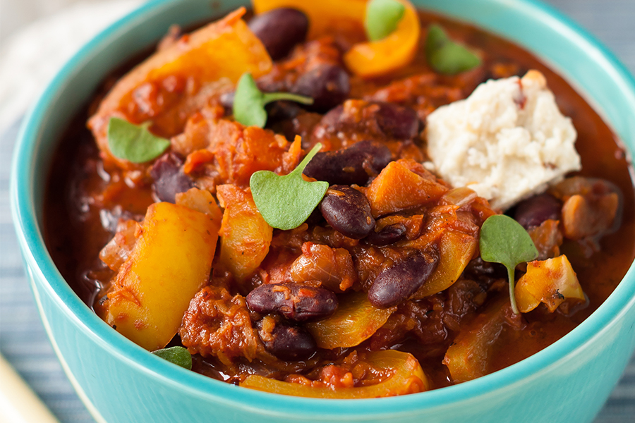Bowl of Smoky Black Bean, Sweet Potato, and Dark Chocolate Chili