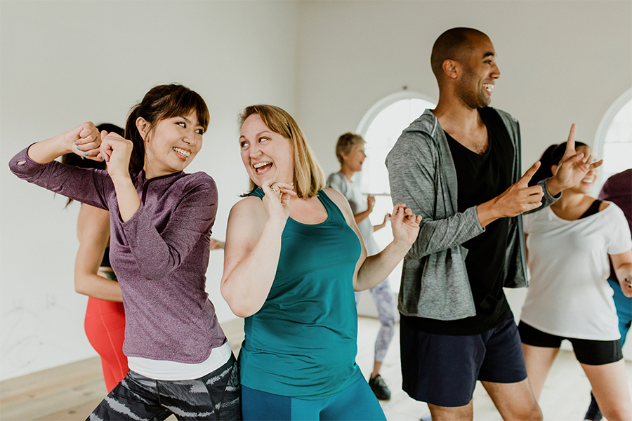 Group of people dancing for exercise