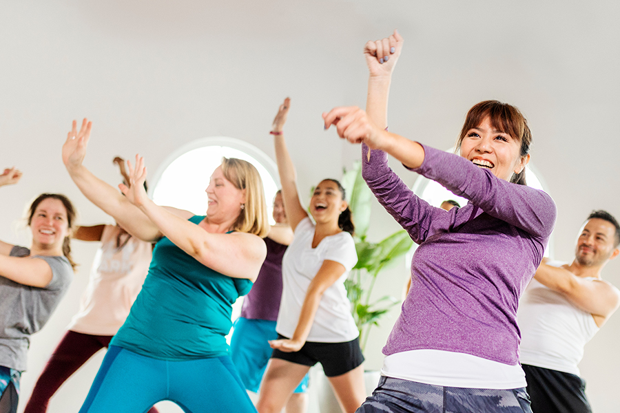 Group of people dancing for exercise